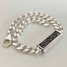 "Bold and masculine in its design but delicate in meaning, this 3D men's sterling silver box bracelet is a talisman for protection featuring a Hebrew engraving of the Jewish Priestly blessing. The prayer on one side reads: \"May God bless you and guard you. May God show you a favor and be gracious to you. May God show you kindness and grant you peace.\" And on the other side: \"And whatsoever he doeth shall prosper\" (Psalms 1:3). This men's bracelet is a perfect gift for the man in your life, a Sterling Silver Spiritual Bracelet, Silver Symbolic Rectangular Jewelry, Spiritual Bracelet With Polished Finish As Gift, Silver Rectangular Jewelry With Engraving Option, Classic Etched Sterling Silver Bracelet As Gift, Rectangular Sterling Silver Bracelet With Clasp, Rectangular Bracelet With Sterling Silver Clasp Gift, Spiritual Sterling Silver Bracelet Gift, Etched Sterling Silver Bracelets As Gift