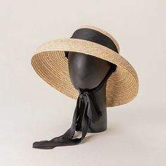 Discover the Perfect Summer Companion Embrace the sun while staying cool and protected with our Stylish Wide Brim Summer Beach Straw Hat. Perfectly blending fashion with function, this hat is designed for both men and women who enjoy the outdoors while looking effortlessly chic. Whether you're planning a day at the beach, a stroll through the park, or an outdoor gathering, this hat promises to elevate your style and provide essential sun protection. Exceptional Features Our straw hat is crafted from high-quality materials, ensuring breathability and comfort. The unique lamp shape design not only stands out but also provides ample shade, protecting your face and neck from the sun's harmful UV rays. Its solid pattern and neutral color make it versatile enough to complement any summer outfit. Beach Straw Hat, Sweat Belt, Wide Brim Straw Hat, Boho Hat, Hepburn Style, Beige Boho, Unique Lamps, Beach Hat, Brim Hat