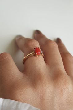 RING DETAILS: ✪Design: Gold ring ✪Gemstone: Natural coral ✪Gemstone color: Red ✪Gemstone size: 7x5mm ✪Gemstone shape: Oval ✪Setting type: Prong ✪Metal type: 14k solid yellow gold ✪Metal finish: Smooth shiny Choose your ring size from drop down menu and if you need any other preferred ring size please contact us. QUALITY OF MATERIALS: Metal: Most of our jewelry at JewelryMansion is made with precious metals like gold and silver. These metals are 100% non-allergic to our skin. Gemstone: All of our October Birthstone Ring, Oval Setting, October Birthstone Rings, Coral Gemstone, Solid Gold Ring, Natural Coral, Red Gemstones, October Birthstone, Ring Gemstone