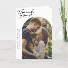 a thank card with an image of a couple kissing and the words thank you on it