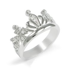 A beautiful sterling silver crown ring with simulated diamonds, perfect for the royal in you. This ring is the perfect touch of class and sophistication. Find your inner queen! Please specify ring size in drop down bar. Classic Diamond Ring With Crown Design For Formal Occasions, Classic Crown Design Diamond Ring For Formal Occasions, Classic Formal Diamond Ring With Crown Design, Formal Cubic Zirconia Crown Ring, Formal Crown Shape Cubic Zirconia Rings, Formal Crown Shaped Cubic Zirconia Rings, Crown Shaped Cubic Zirconia Rings For Formal Occasions, Formal Crown-shaped Cubic Zirconia Ring, Formal Rings With Crown Shape And Prong Setting