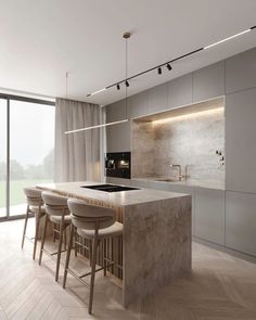 a modern kitchen with marble counter tops and stools