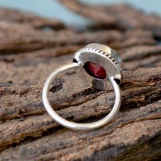 Ruby Gemstone Ring, Bezel Setting Statement Ring, 925 Sterling Silver Ring, Round Faceted Red Ruby Gemstone Ring ,Designer Gift Ring- Native-02 Ruby is a red variety of corundum, an aluminum oxide with a hardness of 9. Its crystal system is hexagonal (trigonal). It forms in prismatic, tabular, bipyramidal or rhombohedral crystals. It also occurs in granular or massive habits. It is an extremely hard and durable gemstone. Meaning: Ruby means 'red gemstone'. The name originated from French and Eng Garnet Rings With Stone Setting, Sterling Silver Ruby Ring With Stone Setting, Sterling Silver Ruby Ring With Open Setting, Red Round Stone Jewelry With Bezel Setting, Gift Ruby Ring With Bezel Setting In Sterling Silver, Red Birthstone Ring With Bezel Setting In Sterling Silver, Sterling Silver Open Ring With Ruby Stone Setting, Garnet Bezel Setting Ring As A Gift, Garnet Ring With Bezel Setting As Gift