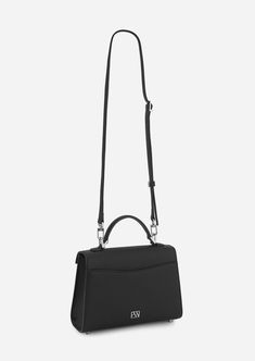 Inspired by Grace Kelly's enduring style, the Grace Top Handle Bag is meticulously crafted from premium USA full-grain textured calfskin leather, ensuring both durability and elegance. Its timeless and versatile design features a thoughtfully structured interior that comfortably accommodates all your everyday essentials. Whether day or night, you'll find yourself instinctively reaching for this chic and easy-to-wear masterpiece. Office Flap Bag With Palladium Hardware And Top Handle, Office Flap Bag With Top Handle And Palladium Hardware, Timeless Flap Bag With Palladium Hardware For Everyday Use, Timeless Flap Bag With Detachable Handle For Daily Use, Classic Structured Textured Leather Bag, High-end Bags In Textured Saffiano Leather, Timeless Structured Bag With Detachable Handle, Timeless Top Handle Satchel With Adjustable Strap, Timeless Structured Bags