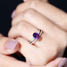 Product Details If youre a modern minimalist who loves to go all vibrant with her choice of accessories, this Amethyst Solitaire Ring Set is the one for you. It compromises of an Alluring Amethyst Ring, complemented by a matching Diamond Band. Sure to turn heads, the Solitaire Ring features a Single Centerpiece of 6X8 MM Oval Shape Amethyst held by Peg Head Setting, exuding glamour. It is further beautified by the glitz of Round Shape Diamond on either side. The matching Diamond Band brings toge Glitter Vans, Solitaire Ring Set, Pearl Earring, 18k Yellow Gold Ring, Ring Sizer, Diamond Band, Amethyst Ring, Diamond Bands, Yellow Gold Rings