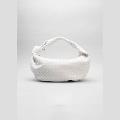 Bottega Veneta small hobo bag in signature intrecciato woven leather. Hardware: Silver finish. Flat top handle, 11.8" drop. Zip top closure. Interior, one zip pocket. Calfskin lining. Bag weighs approx. 0.4 lb./ 0.2 kg. 15.8"H x 18.9"W x 6.3"D. Made in Italy. High-end Pouch Bag With Handles, Luxury Tote Baguette Bag, Luxury Pouch Shoulder Bag With Handles, High-end Pouch Shoulder Bag With Handles, Luxury Pouch Baguette Bag For Shopping, Luxury Double Handle Baguette Bag For Shopping, Designer Baguette Tote Bag With Top Carry Handle, Luxury Pouch Bags With Handles, Designer Everyday Luxury Bag With Handles