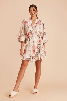 Your bridal suite will be in full bloom with these romantic getting-ready outfits. Gift your squad with these Cream Floral floral bridesmaid robes. The perfect getting-ready robe covered in feminine details and the most modern florals | Cream Floral Getting Ready Georgette Size XS/S | Birdy Grey Kenny Floral Ruffle Robe Summer Floral Print Robe, Bridesmaid Getting Ready Outfit Floral, Spring Floral Print Fitted Robe, Floral Robes For Women Near Me, Summer V-neck Robe With Floral Print, Bridesmaid Robes Floral, Floral Bridesmaid, Floral Ruffle, Bridesmaid Robes