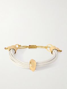 TOHUM's 'Terra Mali' bracelet is made from strands of white leather. It’s accented with rounded gold-plated hardware and stacks beautifully with the different colors available in our edit. Flat Dress Shoes, Floral Dresses Short, Raffia Bag, Fine Jewelry Designers, Beauty Accessories, Fashion Bracelets, Fashion Watches, White Leather, Jewellery And Watches