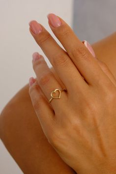 "14K Gold Heart Ring, Open Heart Ring, Dainty Gold Band Ring, Love Heart Ring, Promise Ring, Minimalist ring, Heart Gold Ring, Best Friend Ring Features *Material: 14K Real Gold *Color Options: Yellow Gold, White Gold, Rose Gold *Metal Stamp: 14K (585) *Available Ring Sizes: 3US to 10US Size *Weight(approx) : 1.50 grams *Ready to Ship in 3-5 Business Days. FREE Express worldwide shipping. FREE Engraving service Each item is made to order. Comes in a Gift Box with 14K Gold Certificate. This produ Small Rings Simple Gold, Ring Designs Heart Shape, Heart Gold Ring Design, Gold Heart Ring Simple, Gold Rings Heart, Cute Small Rings, Simple Dainty Rings, Gold Ring Heart, Dainty Promise Rings Simple