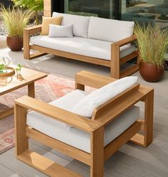 a living room with two couches and a coffee table