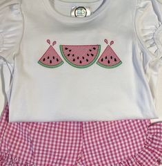 Custom embroidered Watermelon shirt for girls.    A name may also be added!! Choose your font choice and thread color if a name is to be added for your little girls watermelon shirt. List these in the personalization section. I apply tender touch to back of embroidery design as to not scratch your little one.  Matching shorts can be found in separate listing.  Wash in cold water inside out and line dry. Warm iron if needed.  I look forward to making something special for little one.  If you have any questions please feel free to message me. Pink Short Sleeve T-shirt With Machine Embroidery, Cute T-shirt With Machine Embroidery And Short Sleeves, Fitted Summer Tops With Embroidered Graphics, Cute Pink T-shirt With Machine Embroidery, Pink Strawberry Print Shirt For Summer, Pink Strawberry Print Summer Shirt, Summer Pink Shirt With Strawberry Print, Fitted Summer T-shirt With Strawberry Print, Fitted Strawberry Print T-shirt For Summer