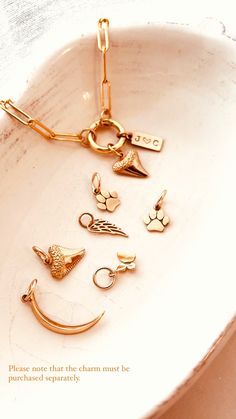 Mix and match your favorite pendant charms to create a personalized piece of jewelry. Each charm is sold separately and individually. Item Details:This is a listing for ONE(1) Gold Charm. ( Including a 14k gold-filled jumping 7mm ) Tiny Butterfly Charm, Natural Bronze, 10mm.Paw Charm, Natural Bronze, 9mm.Shark Tooth Charm, Natural Bronze, 11mm.Wing Charm, Natural Bronze, 15mmCrescent Moon charm Natural Bronze, 22 mm *Natural Bronze - Our bronze is a high-quality Italian copper and tin alloy cont Tiny Butterfly, Tooth Charm, Mini Butterfly, Shark Tooth, Shark Teeth, Moon Charm, Butterfly Charm, Gold Charm, Mix N Match