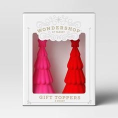 two red and pink christmas trees in a white box with the words wondershop at target