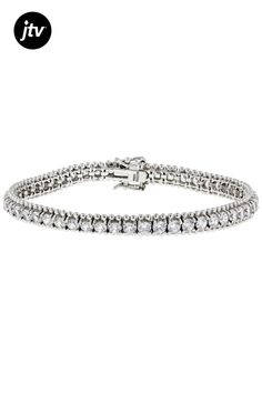 Bella Luce �� white diamond simulant 16.00ctw round, rhodium over sterling silver bracelet. Available in sizes 7.25" and 8" L x 0.25"W and has a hidden box closure. Diamond White Sterling Silver Tennis Bracelet, Classic Sterling Silver Tennis Bracelet With Sparkling Stones, White Cubic Zirconia Jubilee Bracelet, Dazzling Sterling Silver Bracelets With Diamond Accents, White Jubilee Bracelet With Cubic Zirconia, White Jubilee Bracelet Jewelry With Cubic Zirconia, Sterling Silver Tennis Bracelet With Brilliant Cut, Silver Tennis Bracelet With Diamond-cut Cubic Zirconia, Sterling Silver Tennis Bracelet With Sparkling Stones