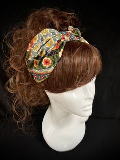 Fabric turban head band in a retro cotton print, on the 1940s land girl style and 1950s Rockabilly fashions. A real statement piece with a standard 1 inch width inner Alice band attached within the lining to provide an easy to wear design. Our range of turban bands are the perfect easy to wear accessory and are worn exactly as an Alice band finishing behind the ears. (These bands do not go all the way around the back of the head, so are perfect for all hair styles. This unique creation is a stun Bohemian Summer Headband, Bohemian Adjustable Headwrap With Matching Headband, Adjustable Bohemian Headwrap Headband, Adjustable Bohemian Headwrap With Matching Headband, Bohemian Festival Hair Accessories, Bohemian Floral Print Summer Bandana, Bohemian Headband Hair Accessories For Spring, Bohemian Spring Headband Hair Accessories, Bohemian Style Headband Hair Accessories