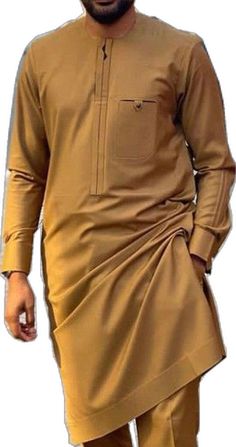 Brown Long Sleeve Traditional Wear For Eid, Traditional Long Sleeve Agbada For Ceremonies, Elegant Brown Festive Kaftan, Formal Festive Thobe With Dabka Detailing, Festive Formal Thobe With Dabka, Festive Brown Elegant Kaftan, Festive Formal Thobe With Dabka Detailing, Elegant Brown Long Sleeve Thobe, Festive Long Sleeve Agbada For Wedding