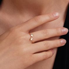 1- P R O D U C T ∙  D E S C R I P T I O N Designed with precision, this dainty Two Star Open Ring in 14K Solid Gold is a symbol of elegance and sophistication. Ideal for women who adore celestial jewelry, this double star ring serves as a perfect gift for her. Handcrafted with 14k gold, it's not only a piece of jewelry, but a lasting keepsake that promises durability and timeless appeal. 2- P R O D U C T ∙  D E T A I L S * Gold material: 14K solid gold * Choice of gold color: Yellow gold, Rose gold, White gold * Choice of ring size: - 5 US/CA - 5 1/4 US/CA - 5 1/2 US/CA - 5 3/4 US/CA - 6 US/CA - 6 1/4 US/CA - 6 1/2 US/CA - 6 3/4 US/CA - 7 US/CA - 7 1/4 US/CA - 7 1/2 US/CA - 7 3/4 US/CA - 8 US/CA - 8 1/4 US/CA - 8 1/2 US/CA - 8 3/4 US/CA - 9 US/CA * Dimensions: Thickness: 1.30 mm  3- S H I Fine Jewelry Star-shaped Ring For Gift, 14k Gold Star-shaped Ring For Gift, Fine Jewelry Star Shaped Rings For Gifts, Star-shaped 14k Gold Stamped Ring, Star-shaped Yellow Gold Rings As Gifts, Celestial Star Jewelry For Anniversary, Celestial Star-shaped Jewelry For Anniversary, 14k Gold Star-shaped Fine Jewelry, 14k Gold Star-shaped Jewelry For Anniversary