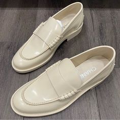 Chanel Ivory Shiny Leather Loafers Oxford Shoes Ivory Leather Gold Tone Chanel Logo On The Back Round Toe Made In Italy Please Note This Item Comes Without Box Cream Slip-on Flats For Office, Classic Cream Slip-on Moccasins, Formal Cream Slip-on Flats, White Flat Loafers For Business, Classic Beige Platform Loafers With Round Toe, Chic White Leather Closed Toe Shoes, Chic White Closed Toe Leather Shoes, Chic Patent Leather Platform Loafers With Almond Toe, Classic Beige Leather Shoes With Brogue Detailing