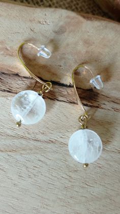 Delicate White Earrings For Everyday Wear, Handmade White Crystal Earrings, Minimalist Adjustable Crystal Earrings, Handmade White Crystal Round Earrings, Simple Nickel-free White Jewelry, Simple White Nickel-free Jewelry, Minimalist White Crystal Earrings, Minimalist White Crystal Pierced Earrings, Handmade Minimalist Dangle Crystal Earrings