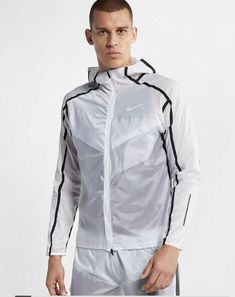 ~ Nike ~  Men's Tech Pack Running Jacket  Style: AQ6711 - Color: 100 White/Black - Size: XL  ~ Brand New with Tags - Retail $150.00 ~ Tech Pack melds technical innovation with forward-thinking design to deliver functional solutions that embody the intersection of sport and style  Super lightweight, soft translucent nylon fabric Water Repellent Reflective Trim 2-way zipper Internal, zippered chest pocket Adjustable Hood, Upper back vent Armpit to armpit measures approx. 26.5" Men Exercises, Jacket Nike, Tech Pack, Bike Style, Nike Tech, Running Jacket, Nike Store, Man Running, Sport Wear