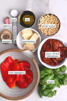 ingredients to make sun dried tomatoes with basil, pine nuts, parmesan cheese and pepper