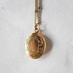 Personalize our popular Locket Necklaces with hand stamping on the inside! Lockets on 18" gold or silver plated satellite chain. Add on a small accent/birthstone for an additional $5 here: https://bit.ly/BVJBirthstoneAddOn Please tell us what you would like stamped on the charms in the "Notes" section at check out. Handcrafted in Little Rock, Arkansas Our images are the best representation of our designs and there may be some variation in your shipment due to the handmade nature of our products. Yellow Gold 14k Stamped Pendant Locket Necklace, Victorian Locket Necklace Stamped 14k, Antique 14k Stamped Locket Necklace Collectible, Vintage Stamped Pendant Locket Necklace, Engraved Silver-colored Brass Locket Necklace, Round Necklace, Hand Stamped Jewelry, Stamped Jewelry, Brass Jewelry