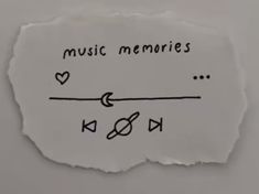 a piece of paper with the words music memories written on it and an arrow drawn in black ink