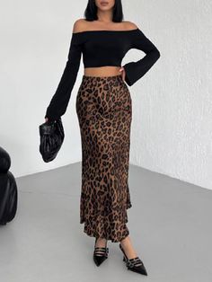 Fitted Long Skirt In Leopard Print, Leopard Print Skirt For Fall Party, Chic Leopard Print Midi Skirt, Casual Leopard Print Skirt For Fall, Chic Flowy Leopard Print Skirt, Fall Leopard Print Skirt For Party, Leopard Print Pencil Skirt For Party, Fall Leopard Print Party Skirt, Fitted Elegant Leopard Print Skirt