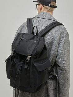 Editor's NotesStore up to 15 laptops. High-density nylon fabric has been interlocked to prevent wrinkles and loosening. 210D nylon lining fabric makes it less dirty and more durable. It is an adjustable length strap that anyone can wear according to their size.- Store up to 15 laptops- Drawstring closure- Mesh cushion on the back- Durable- Adjustable shoulder strap- YKK zipper Measurements (in.)One size- Height: 16.92 in.- Width: 12.99 in.- Depth: 7.08 in.- Weight: 630gCompos Luxury Casual Nylon Backpack, Cheap Nylon Men's Backpack, Cheap Modern Nylon Backpack, Luxury Casual Backpack For Streetwear, Cheap Modern Backpack, Cheap Modern Standard Backpack, Luxury Urban Standard Backpack, Luxury Leather Backpack For Streetwear, Luxury Nylon Backpack For On-the-go