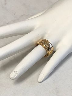 A Beautiful Wedding/Anniversary/Stackable Band that is very made well with engraved design patterns. METAL: 14kt Yellow Gold WIDTH: 10mm WEIGHT: 9.13 grams FINGER SIZE: 6 3/4 FREE SHIPPING Regular Retail Price: $1,590.00 Thick Band 14k Stamped Wedding Jewelry, Gold Wedding Ring Stamped 14k, Gold Round Wedding Ring With Polished Finish, Polished Round Gold Wedding Ring, Luxury Ceremonial Diamond-cut Jewelry, Luxury Ceremonial Diamond Cut Jewelry, Gold Wedding Band Stamped 14k, Gold Stamped 14k Round Wedding Band, Yellow Gold 14k Stamped Jewelry For Marriage