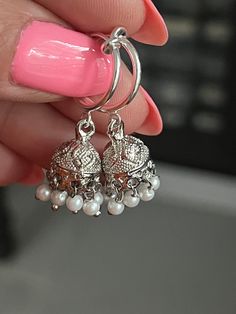 Extra small silver plated jhumki earrings on clip on hoops, Indian style clip on earrings  Earrings dangle 1.50 inches long and are super light perfect for everyday wear.  These beauties are for non pierced ears, they are clip on style. Earrings For Everyday Wear, Cheap Metal Jhumkas With Latkans, Cheap Bohemian Metal Jhumkas, Traditional Silver Dangle Clip-on Earrings, Silver Round Clip-on Earrings For Festive Occasions, Sterling Silver Drop Jhumkas, Silver Earrings With Bells For Festivals, Sterling Silver Jhumkas, Silver Dangle Earrings With Bells