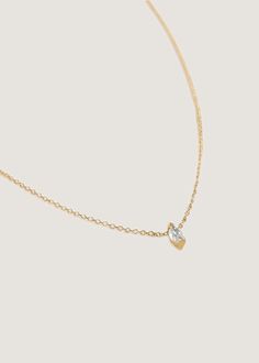 The Solitaire Marquise Diamond Necklace is an everlasting piece. Wear on its own or layer with a herringbone chain for a bolder look. The marquise diamond hangs on a Micro Rolo Link Chain. 14k solid gold—always Chain thickness: 1mm Carat weight: 0.20cw Diamond clarity: SI1 Lobster clasp closure This piece is only available for pre-order and is expected to ship mid January 2025. Marquise Diamond Necklace, Fall Rings, Gold Baroque, Oval Locket, Herringbone Chain, Heart Locket Necklace, December 2024, Diamond Charm, Broken Chain