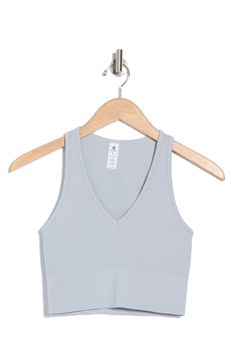 This seamless tank top features an abbreviated hem and waffle stitching to offer a comfy fit whether lounging or being active. V-neck Sleeveless 96% nylon, 4% spandex Machine wash, tumble dry Imported Being Active, Waffle Stitch, Comfy Fits, Crop Tank, Nordstrom Rack, Stitching, Nordstrom, Tank Top, Spandex