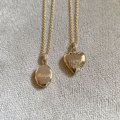 A child's plain polished 14K yellow gold-filled oval locket on a cable chain necklace with a lobster clasp. The outer shell is solid gold pressure-bonded to an inner core of high-quality brass. Locket Dimensions: 10 mm W x 20 mm H Chain Length: 15" Oval Locket, Heart Locket Necklace, Heart Locket, Locket Necklace, Cable Chain, Chain Lengths, Locket, Gold Filled, Solid Gold