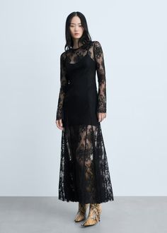 Semi-transparent lace long dress - Woman | MANGO USA Elegant Lace Dress With Sheer Bodice, Sheer Lace Floor-length Dress, Floor-length Sheer Lace Dress, Formal Lace Dress With Sheer Bodice, Sheer Bodice Lace Dress For Formal Occasions, Sheer Lace Floor-length Maxi Dress, Elegant Sheer Midi Evening Dress, Long Sleeve Lace Evening Dress With Sheer Sleeves, Chic Gala Dresses With Lace Trim