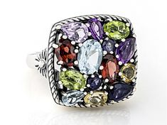 1.03ctw Glacier Topaz™, 0.88ctw Amethyst, 0.41ctw Iolite, 0.90ctw Manchurian Peridot™, 0.92ctw Garnet, and 0.34ctw Citrine Sterling Silver Oxidized Ring. Measures Approximately 0.80"L x 0.74"W. Not Sizeable. Multicolor Oval Amethyst Ring With Gemstone Accents, Elegant Multicolor Amethyst Gemstone Ring, Multicolor Oval Amethyst Gemstone Ring, Elegant Multicolor Amethyst Ring With Gemstone Accents, Elegant Multicolor Amethyst Ring With Accent Stones, Multicolor Oval Amethyst Ring With Accent Stones, Multicolor Oval Gemstone With Center Stone, Elegant Multicolor Gemstones With Center Stone, Anniversary Multicolor Gemstones With Accents