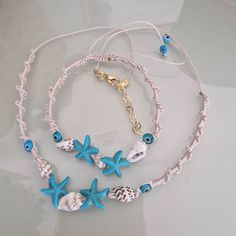 Cheap Handmade Shell Beaded Necklaces, Bohemian Starfish Jewelry For Vacation, Bohemian Starfish Shell Necklace For Summer, Handmade Turquoise Jewelry For Beach Season, Handmade Turquoise Beachy Jewelry, Bohemian Starfish Jewelry For Beach Season, Handmade Adjustable Strand Jewelry, Handmade Starfish Shell Necklace For Vacation, Handmade Beachy Jewelry For Beach Season