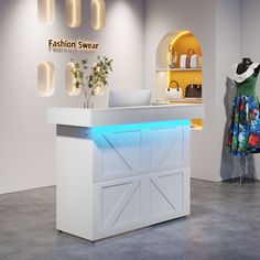 the front desk of a clothing store is lit up