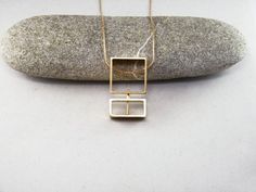 Square pendant Geometric statement long gold necklace Movement jewelry Kinetic necklace Gold Rectang Modern Rectangular Necklace, Modern Gold Necklace With Square Pendant, Modern Metal Necklace With Rectangular Pendant, Modern Gold Rectangular Pendant Jewelry, Minimalist Gold-tone Rectangular Jewelry, Rectangular Yellow Gold Metal Necklace, Modern Rectangular Yellow Gold Necklace, Modern Yellow Gold Rectangular Necklace, Modern Gold Geometric Necklace