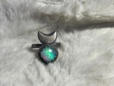 Mystical Iridescent Sterling Silver Jewelry, Mystical Green Gemstone Jewelry, Mystical Iridescent Moonstone Jewelry, Iridescent Moonstone For Jewelry Making, Mystical Round Cabochon Jewelry, Handmade Iridescent Magical Jewelry, Handmade Magical Iridescent Jewelry, Iridescent Sterling Silver Spiritual Jewelry, Iridescent Gemstone Jewelry With Magical Style