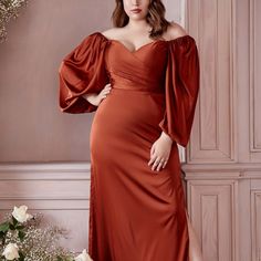 Designed With A Sensual Attitude And Fashion-Forward Details, 7482 Features A Flattering Sweetheart Bodice Complemented With A Slim, Sophisticated Skirt And Side Slit Leg. The Soft Billowy Sleeves Can Be Worn Off-Or-On The Shoulder, Offering A Unique, Versatile Look. This Dress Is A Must-Have For Any Special Occasion. Color Sienna Material: 100% Polyester Open Back Long Dress Occasion: Formal, Evening, Cocktail, Guest Of Wedding, Bridal, Bridesmaid, Banquet, Prom, Ball, Graduation, Special Occas Satin Formal Gown, Long Sleeve Bridesmaid Dress, Cinderella Divine, Beautiful Bridesmaid Dresses, Plus Size Prom, Long Sleeve Prom, Satin Long Sleeve, Bridesmaid Dresses Prom, Plus Size Prom Dresses