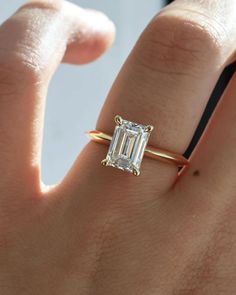 Emerald Engagement Ring, Emerald Cut Diamond Ring, Lab Grown Diamond, Emerald Cut Wedding Ring, Natural Diamond Ring, Single Diamond Ring, Promise Ring For Her, Proposal Ring, Gift This ring features an emerald solitaire diamond elegantly secured in a four-prong setting on a solid gold band for a classic and timeless look 𝐑𝐢𝐧𝐠 𝐃𝐞𝐭𝐚𝐢𝐥𝐬:  ↣ Made-To-Order. ↣ Gold: 14K / 18K Solid Gold.  ↣ Gold Color: Yellow Gold, Rose Gold, White Gold  ↣ Number of Diamonds: 1 ↣ Diamond Cut: Emerald ↣ Setting Type: Prong ↣ We offer FREE ENGRAVING service on all our jewelry.  ↣ Ring Width : 1.50 MM ↣ Ring Thickness : 1.50 MM 𝐋𝐚𝐛 𝐆𝐫𝐨𝐰𝐧 𝐃𝐢𝐚𝐦𝐨𝐧𝐝 𝐃𝐞𝐭𝐚𝐢𝐥𝐬: ↣ Lab Grown Focal Diamond: 0.10 CT, 0.25 CT, 0.50 CT, 0.75 CT, 1.00 CT, 1.50 CT, 2.00 CT, 2.50 CT, 3.00 CT. ↣ Lab Diamond Clarity Emerald Cut Wedding Ring, Knife Edge Engagement Ring, Gold Knife, Single Diamond Ring, Emerald Cut Solitaire Ring, Wedding Rings Emerald Cut, Engagement Ring Emerald Cut, Emerald Cut Diamond Ring, Solid Gold Band