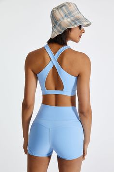 Color_Blue Supportive Blue Sports Bra With Built-in Padding, Blue Sports Bra With Built-in Bra For Workout, Blue Sports Bra With Built-in Bra For Light Exercise, Blue Compression Sports Bra With Built-in Bra, Functional Sports Bra With Light Support And Cross Back, Functional Cross Back Sports Bra With Light Support, Functional Light Support Sports Bra With Cross Back, Functional Light Support Cross Back Sports Bra, Blue Sports Bra With Built-in Bra For Gym