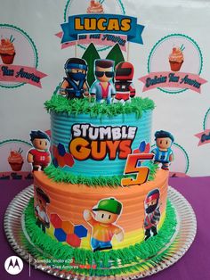 a birthday cake with cartoon characters on it