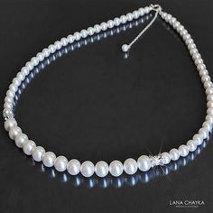 Wedding White Pearl Silver One Row Classic Bridal Statement Necklace. PLEASE READ ITEM DESCRIPTION and SHOP POLICIES before placing your order, and contact me with any questions! NECKLACE is about 18.50 inches (47cm) long. BRIDAL EARRINGS SECTION:https://www.etsy.com/shop/LanaChayka?ref=seller-platform-mcnav&section_id=11638940 BRIDAL BRACELETS SECTION: https://www.etsy.com/shop/LanaChayka?ref=seller-platform-mcnav&section_id=11638942 BRIDAL NECKLACES SECTION: https://www.etsy.com/shop/LanaChayka?ref=seller-platform-mcnav§ion_id=11638944 BRIDAL JEWELRY SETS SECTION: https://www.etsy.com/shop/LanaChayka?ref=seller-platform-mcnav§ion_id=25839214 Elegant and timeless, this beautiful necklace is perfect for weddings or special occasions such as birthdays, anniversaries, graduations, proms...or Elegant Single Strand Bridal Necklace For Wedding, Single Strand Pearl Necklace For Wedding, Elegant Single Strand Necklace For Wedding, Elegant White Pearl Necklace For Wedding, Elegant White Pearl Necklace For Marriage, Classic White Jewelry For Wedding, Classic White Wedding Jewelry, Classic Pearl Wedding Necklaces, Classic Pearl Necklaces For Wedding