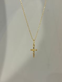 Our cross necklace is a classic, simple and elegant - perfect for everyday wear! Information: ✨ Sterling Silver (925 stamped) | 14K Gold Plated ✨ Adjustable length: 16" - 18" ✨ Hypoallergenic ✨ Tarnish resistant ✨ Water friendly Our cross necklace is highly polished, featuring an splendid level of craftsmanship and attention to detail. On the charm, you can see the image of Jesus on the cross. The charm is dainty and comfortable to wear. Plus, the necklace is adjustable. You have the ability to Cute Cross Necklace Gold, Minimalist Cross Pendant Necklaces For Baptism, Classic Cross Pendant Necklace As Gift, Minimalist Cross Pendant Necklace For Baptism, Classic Everyday Cross Pendant Necklace, Everyday Classic Cross Pendant Necklace, Dainty Cross Necklace For Baptism, Classic Everyday Cross Necklace, Minimalist Cross Pendant Necklace For First Communion