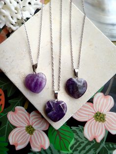 This polished genuine amethyst heart pendant hangs from your choice of chain.The February birthstone, amethyst, is said to strengthen relationships and give its wearer courage. At one time, only royalty could wear the gem. Ancient Greeks thought that the amethyst guarded against intoxication. In fact, “amethyst” comes from amethystos, a Greek word meaning “sober.”Amethysts are the birthstone for February and also traditionally given on the 6th wedding anniversary.- 18" Rhodium Plated Chain. ‚Ä¢ Amethyst Heart Pendant Jewelry For Anniversary, Amethyst Heart Cut Necklace For Anniversary, Heart Cut Amethyst Necklaces For Anniversary, Heart Cut Amethyst Necklace For Anniversary, Anniversary Amethyst Heart Necklace, Amethyst Birthstone Heart Pendant Jewelry, Heart Cut Amethyst Birthstone Jewelry, Heart Cut Amethyst Jewelry For Gifts, Valentine's Day Amethyst Heart Necklace