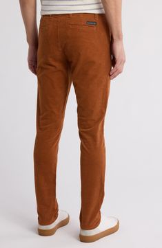 Chino pants with a clean, slim leg are cut from a cotton-blend twill that's soft, a little stretchy and gently faded for a casual look. 11" rise, 31.5" inseam (size 33) Zip fly with button closure Front slash pockets 98% cotton, 2% elastane Machine wash, tumble dry Imported Slim Fit Bottoms With Welt Pockets For Fall, Brown Cotton Jeans With Straight Hem, Casual Fitted Full-length Chinos, Slim Fit Chinos With Welt Pockets For Fall, Slim Fit Cotton Chinos For Business Casual In Fall, Slim Fit Chinos For Business Casual In Fall, Fall Slim Fit Chinos For Business Casual, Straight Fit Chino Cotton Twill Bottoms For Spring, Slim Fit Straight Leg Solid Chinos