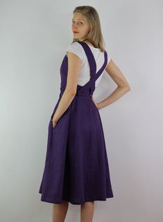 "Handmade purple wrap dress sleeveless and 2 pockets , perfect for casual wear and suitable for any occasion in any season Details: - 100% natural linen produced in Europe ; - medium weight (180 gram per square meter); - color: purple , could be any from our colors catalog (color samples at the photo); Made to order, approximately a few days, If you have any questions please message me and I will be glad to answer. Size guide : Size XS Bust: fits bust around 33\"-34\"/ 84-88 cm Waist: fits waist Purple Dress With Adjustable Spaghetti Straps, Elegant Summer Pinafore Dress, Sleeveless Cotton Suspender Dress With Pockets, A-line Sundress Maxi With Pockets, Purple Sundress With Spaghetti Straps, Summer Purple Dresses With Pockets, Cotton Sleeveless Pinafore Dress With Adjustable Straps, Fitted Sleeveless Linen Dress With Adjustable Straps, A-line Suspender Sundress With Tie Straps