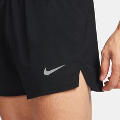 Nike FastMen's Dri-FIT 3" Brief-Lined Running ShortsDesigned for racing, the Nike Fast shorts bring breathability and support to help you move comfortably through every stride. A simple lightweight design and 2 drop-in pockets let you get the most out of your run.Quick-Dry SupportNike Dri-FIT technology moves sweat away from your skin for quicker evaporation, helping you stay dry and comfortable.Cool ComfortWoven fabric is perforated for breathability. An elastic waistband with a drawcord lets y Functional Bottoms With Built-in Shorts For Marathon, Nike Breathable Bottoms For Running Errands, Nike Functional Go-dry Shorts, Nike Functional Athletic Shorts For Jogging, Nike Functional Athletic Shorts For Training, Nike Functional Athletic Shorts For Gym, Functional Nike Athletic Shorts For Jogging, Nike Athletic Shorts For Jogging, Breathable Mesh Athletic Running Shorts